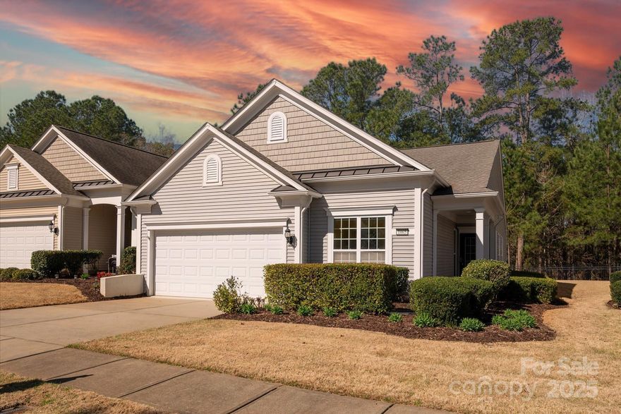 Welcome to 1005 Sweetleaf Drive in the highly desirable Sun City Carolina Lakes tucked close to the entrance! This beautifully maintained single-story home offers an open-concept kitchen with stainless steel appliances, perfect for entertaining, flowing seamlessly into the dining and living spaces. The spacious owner’s suite features a double vanity, large walk-in shower, and an oversized walk-in closet. Step outside to a screened patio where you can enjoy peaceful wooded views, wonderful sunsets and privacy. A two-car garage provides convenience and storage. Sun City residents enjoy resort-style amenities including an expansive clubhouse, golf course, fitness center, indoor and outdoor pools, tennis and pickleball courts, walking trails, and an active social calendar. Fantastic location close to all that Indian Land, Ballantyne & Blakeney have to offer with shopping, dining & health care.  Easy access to I-485 and Charlotte Douglas International Airport. Live the vibrant life, today!