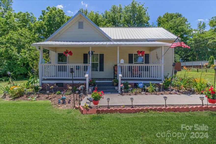 Nestled within the city limits of York, this charming bungalow offers an ideal blend of comfort and character for those seeking a starter home or looking to downsize. Featuring two cozy bedrooms and two modern bathrooms, the home provides ample space for relaxation and everyday living. The inviting rocking chair front porch is perfect for unwinding with a book or enjoying a morning coffee, while the beautifully landscaped, level fenced backyard boasts southern charm and includes an outbuilding for extra storage or a workshop. This delightful home comes with no HOA fees and is eligible for 100% financing, making it an affordable and attractive option. With its unique character and thoughtful amenities, this bungalow is a standout choice in the York housing market.