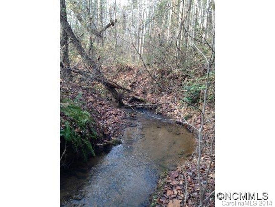 Think Private Haven21.78 acres of beautiful hardwoods with two fern lined creeks meandering through the property creates your own private sanctuary.  Perfect for a family or executive home or a relaxing weekend retreat.  Property Features:â¢ Wooded, private lotâ¢ Two creeks â¢ Convenient to the quaint town of Landrum for shopping and diningâ¢ Easy access to I-26 for the business travelerâ¢ 25 miles to Spartanburg