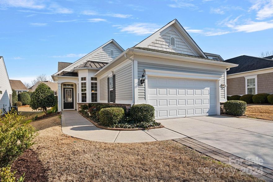 Welcome to this inviting ranch home in Sun City Carolina Lakes, featuring an open floor plan that seamlessly connects the dining room space and living room.  Hardwood floors adorn the living areas, leading to a spacious primary suite, 2 bedrooms and full bath.  The primary suite looks out to the backyard and features a spacious bathroom with a beautifully tiled shower and large walk-in closet. The kitchen features granite counters, gas stove, breakfast area, and an office nook.  A sunroom with double sliding glass doors floods the space with natural light, offering a serene retreat year-round. Step outside to enjoy the covered patio with ceiling fans and a private yard. Experience comfort and elegance in this meticulously designed home. Large two car garage with shelving. Refrigerator and Washer/Dryer convey.  Sun City is known for its active lifestyle and amenities.  From the 18 hole golf course to the pickle ball courts, there is something for everyone. Live like a kid again!