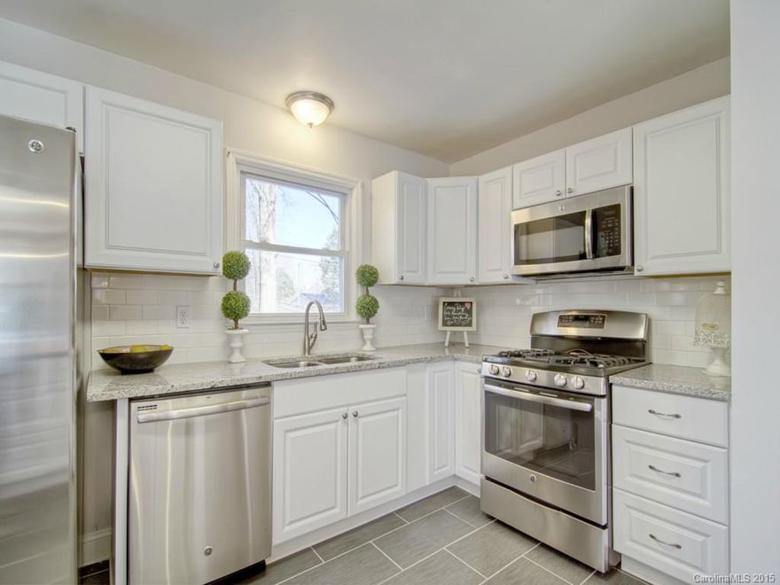 Don't miss this gem located in one of S Charlotte's most sought-after neighborhoods! COMPLETE renovation by professionals! Breathtaking high-end finishes in the kitchen & bathrooms, refinished original hardwood floors with a dark walnut stain, stainless steel appliances, four bedrooms with a BONUS ROOM! Master bedroom on upper level. The style in this jewel flows from one room to the next! Complete with a babbling brook in your backyard! Priced to sell and will not last long!