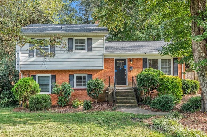 This Charlotte two-story home offers granite countertops.