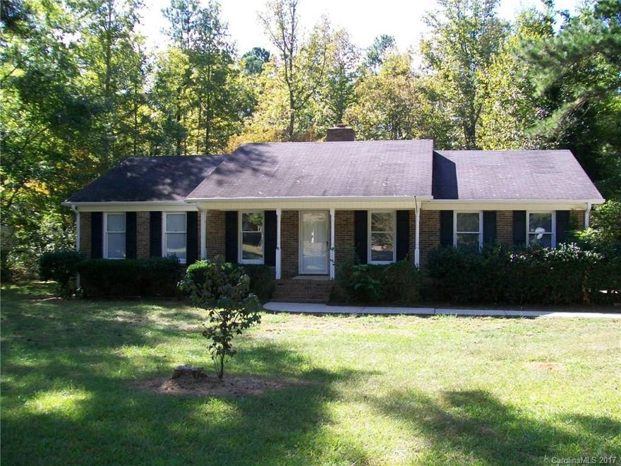 Wonderful brick home. Just updated with caret, vinyl, and paint.  New decking  overlooking 1/2 acre private yard.  Large living area with vaulted ceiling brick fireplace.  Won't last long!