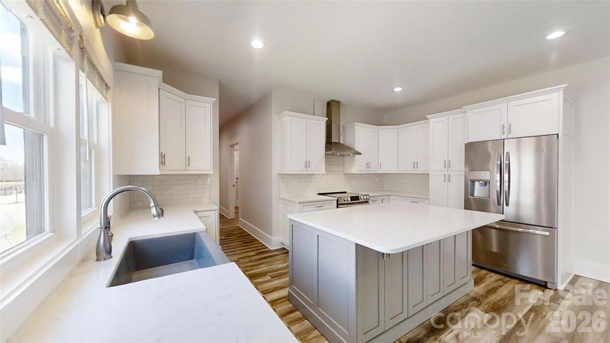 If you’ve been looking for newer construction with room to spread out, this is it. Built in 2021 and sitting on 1.72 acres, this 4 bedroom, 2.5 bathroom home welcomes you with a deep front porch made for rocking chairs and relaxed evenings.  Inside, the layout is both spacious and practical. The kitchen includes pull-out cabinet shelves for easy access and the refrigerator will remain with the home. Just off the garage is a large drop zone area that’s currently a blank slate and ready for you to customize however you’d like. It would a perfect drop zone, work or study area.
The primary suite features a large bathroom with a giant walk-in shower, soaking tub, and double sinks. The primary suite also has a door leading to the deck. One of the secondary bedrooms includes a walk-in closet, and the laundry room is generously sized with a large lockable storage closet.
Additional features include keypad entry at the garage, a 3-stage water filtration system for the well, and a large gun safe that will remain with the home.
Outside, the 1.72 acre property gives you plenty of space to spread out, with blueberry bushes and apple trees already planted. Located in a great school district with North Lincoln Schools.