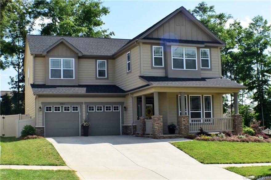 Motivated Seller!! Immaculate-shows like a model! 4BR/2.5B PLUS upstairs loft & flex space downstairs. Located on a cul-de-sac with a fenced yard and greenspace area directly across the street! Hard woods on main level, wainscoting, granite, study w/french doors, and rocking chair front porch. Walking trails, playgrounds, pool & Harvey's Neighborhood Bar & Grill.  Construction of a back yard retaining wall is complete and provides space for fire pit, playground, etc...