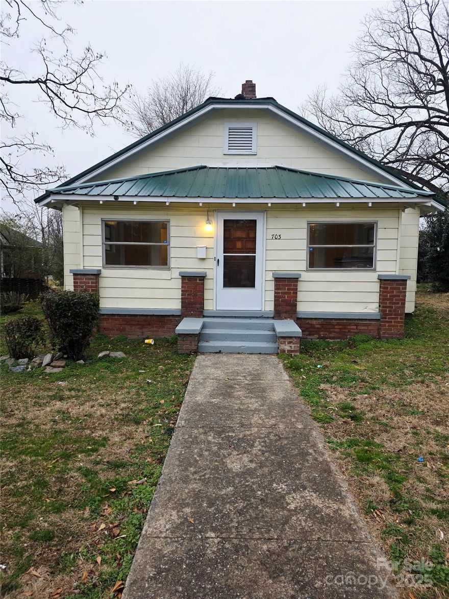 Welcome to this beautifully renovated and updated home, featuring a brand-new dual AC and heating system, new kitchen windows, a new screen door, updated window clamps, modern lighting fixtures, ceiling fans, and a freshly painted roof. This spacious three-bedroom, two-bath home offers generously sized rooms and a freshly painted, enclosed front porch—perfect for relaxing and entertaining.  $1000 Sellers credit with acceptable offer!

There is a shared driveway agreement in book 1154 page 1073 Cleveland County Register of Deeds.