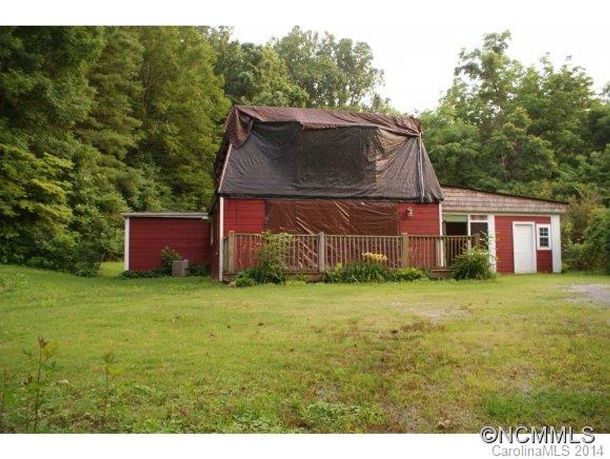 Great investment opportunity in Saluda.  Sold "AS IS WHERE IS" by special warranty deed.  No representations/warranties by seller or broker.  Roof needs to be replaced, leaking has created water damage in home.  Flooring and much drywall has been removed