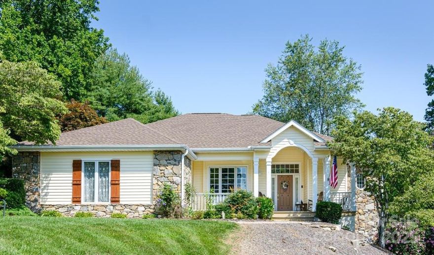 PRICE REDUCED, MOTIVATED SELLER! This is a great opportunity to buy in desirable Sugar Hollow Farms! This low-maintenance home welcomes you with a large, covered front porch leading to comfortable interior living on the main level, with no steps. Soaring ceilings! Enjoy the two-sided corner fireplace from the living room and den. A WALL OF WINDOWS makes this home light and bright! The living areas and primary bedroom suite have hardwood floors. The kitchen and baths feature custom hickory cabinets. Two more bedrooms, a full bath and utility room are all on main. Lower level is plumbed for another bath, and offers a large family room (w/painted concrete floor) plus two "flex" rooms for a home office, crafts and more. A large unfinished area on the lower level is perfect for a workshop or storage. Outside, mature landscaping enhances this home's lovely setting. All this in a pastoral, peaceful and friendly neighborhood, close to Kanuga Conference Center and the Ride Kanuga bike park, and just a few miles from downtown Hendersonville, Flat Rock, DuPont and Brevard.