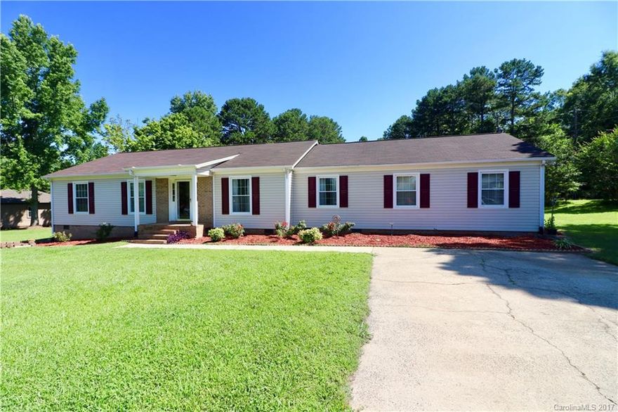 Lovely flat acre lot - One level living!!New Above-Ground Pool(54"deep-24'diameter)& Hot Tub surrounded by beautiful private deck,Plus Out bldg--great for storage!Huge Living/Dining Room Combo w/2 Ceiling Fans & Chair Railing.Kitchen with Updated Raised Panel Cabinets,Granite Counters, Slate Bksplsh, blt-in wine rack, Gas cooktop, SS wall oven/microwave, Pendant Lighting,Tiled Flooring in kitchen/bkfst area. Updated Baths.Ceiling fans thruout. Laminate Flrs in Den,Carpet in Flex Rooms. Roof 2011