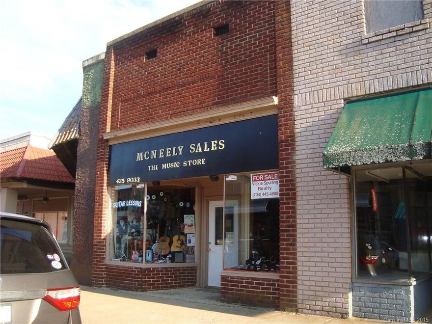 Business property currently occupied as Music Store, heat source gas space heater ceiling mount, window unit air, roof leaks at present time, owner has quotes for repair but at this great price he does not plan to repair, building is located in down town Cherryville area, has 2 display windows, half bath, retail and workshop space