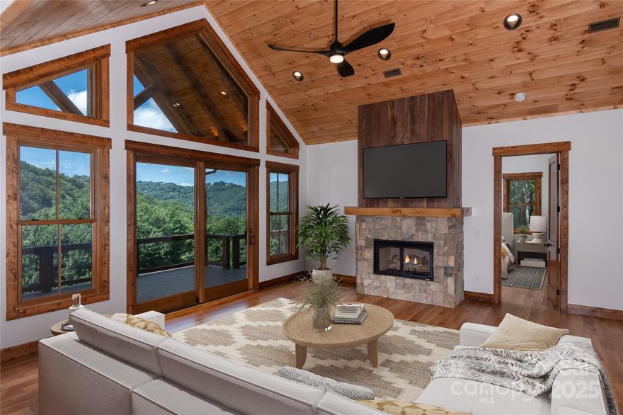 Located in exclusive gated Silver Springs Farm Estates with low annual HOA, amongst all High Country has to offer, NEW CONSTRUCTION & MOVE-IN READY! 3178 square feet, 4 bedrooms, 4 full bathrooms, 3 car garage, newly paved driveway, +1200 sqft outdoor space wwith main level porte-cochere, covered porches with mountain views, 2 fireplaces, multiple floor to ceiling sliding doors & designer selections throughout. Main level: Kitchen with custom wood cabinets, stainless steel appliances, farmhouse sink & dining room overlooking living room with gas fireplace & sliding doors leading to covered porch desirable for indoor/outdoor living year-round. Primary with mountain views & 2 walk-in, custom built closets. Primary bath with double vanities, backlit mirrors, tub, shower & water closet. 2nd bedroom & full bathroom on main level. Basement: 2 bedrooms, 2 full bathrooms, laundry rm with sink, family/game room with gas fireplace, sliding doors lead to covered porch. Natural gas, outdoor fire pit & more. Located within 1 mile of Banner Elk, accessible to High Country’s finest for all 4 seasons!