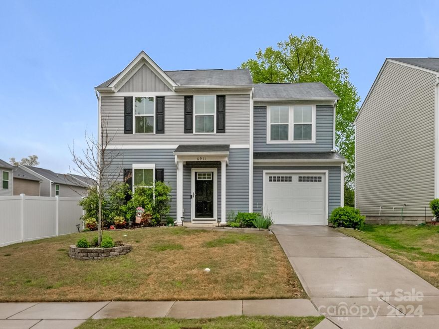 This like-new, move-in ready home is sure to delight.  So many things to love: the interior gets great light and has the open-concept floorplan so many of today's buyers are searching for.  Luxury vinyl tile floors throughout the main level; kitchen opens to the family room and features recessed lights, stainless steel appliances and a convenient work island; beautiful contemporary ceiling fans in all three bedrooms plus the family room.  Large, deep lot is fully fenced with plenty of space for play. Conveniently located to Independence Blvd, I-277, I-77, and I-85 and just a 15 minute commute to uptown. The light rail Silver Line Project, connecting uptown to Matthews, is expected to build a stop near this neighborhood.  Timeline unknown but information can be found at https://www.charlottenc.gov/CATS/Transit-Planning/Silver-Line/Silver-Line-Project. Property extends beyond back fence line, see survey.