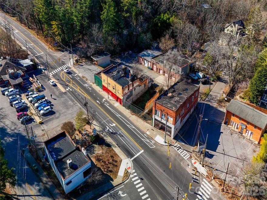 A One of a kind redevelopment opportunity, prominently sited on high traffic Merrimon road. This 2 parcel grouping sits at the gateway to UNC Asheville, on the corner of Chatham Road, with walkability to downtown Asheville, and is prime for new vision. Can be acquired as part of a larger offering including the two adjacent Merrimon fronting properties, if desired.  Ideal opportunity for a mixed-use redevelopment project. Existing early 1900s two story masonry building may have potential for adaptive reuse and incorporation into new master plan, buyer to verify.