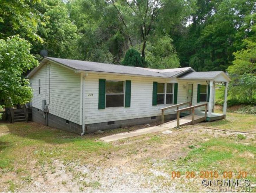 Desirable Mills River Area. Doublewide on level lot.  Close to Shopping, schools and banks."As Is", "Where Is", Property being sold subject to HUD Guidelines 24 CFR 206.125  Please see attached for explanation.  Assumption being made that there is a septic and well. Roof may need replacing, mold may be present and please use caution when walking on floor in sunroom