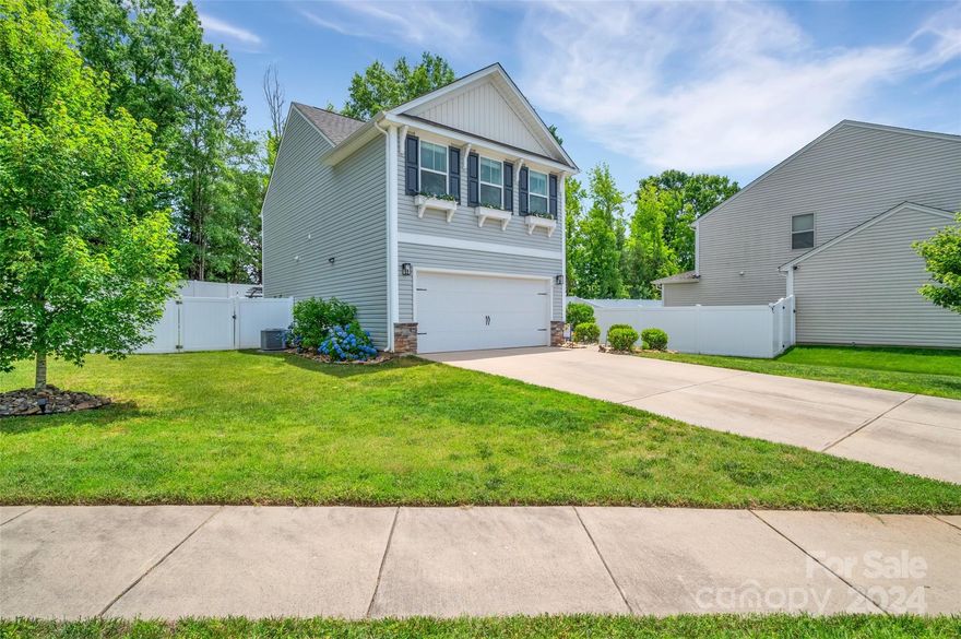 WOW! WOW! WOW! CUSTOM FEATURES WILL IMPRESS YOU!! 3BR 2.5BA with DOUBLE GARAGE ON CORNER WITH FENCED WOODED REAR and EXTENDED PATIO AND PERGOLA! All interior FIXTURES UPDATED, Decorative Kitchen Tile Upgrade, Laminate Wood on BOTH LEVELS AND STAIRS!! CUSTOM-BUILT Kitchen Island with Heringbone Pattern and glass top PLUS EXTENDED LEAF AND ADDITIONAL STORAGE BELOW. Half bath downstairs with elegant Shipplap, updated fixtures and mirror. WOW! WHAT A PRIMARY SUITE!!! SPACIOUS LIVING WITH BEAUTIFUL BARN DOOR AND ACCENT WALL WITH HERINGBONE PATTERN! RE-DESIGNED CUSTOM WALK-IN CLOSET GIVES YOU ALL THE SPACE YOU NEED!!  PRIMARY BATH WITH SHIPPLAP WALL, UPDATED CABINETS AND FIXTURES, DUAL SINKS, WATERFALL AND HANDHELD SHOWERHEAD!! You'll love waking up here!! Garage has additional overhead storage built-in for easy bin storage. Rear yard is a treat with fenced yard, tree-lined and raised plant beds and herb garden! All there is to do with this one is LIVE IN IT AND LOVE IT!!