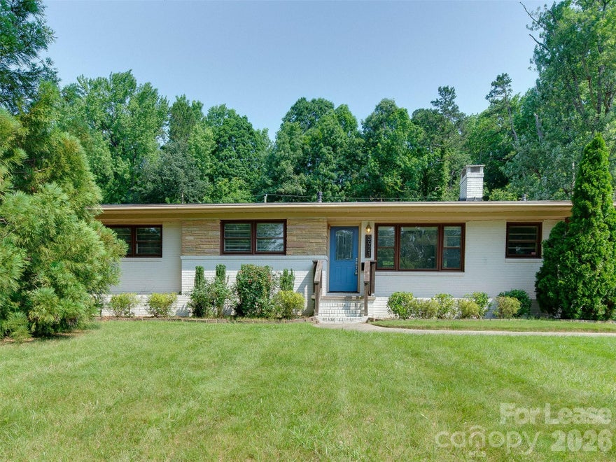 Updated and stunning Sheffield Park home that is ready for you! Enjoy the convenient location and privacy from having a nature preserve in the back yard! The large and plentiful windows brighten the path as you walk on the refinished hardwood floors.  The living room (with fireplace) opens to the amazing kitchen complete with SS appliances, gas range, designer fridge and more!  The sunroom/breakfast area is a great place for a home office, craft area or spot to relax.  The oversized primary suite has its own decorative fireplace, walk in closet and stunning bathroom complete with whirlpool tub, dual vanity with marble top AND walk in shower! The two additional bedrooms share an updated bath as well! All of this just minutes to great shopping, dining, parks, Starbucks (2 min drive), 74, Uptown and Midwood. Check out the amazing yard!  Internet, washer and dryer included!  Take a look today! Garage is not for tenant use.