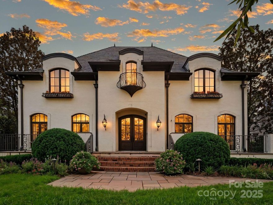 Welcome to this stunning European style home in the heart of Eastover! Built in 2007, this 6,730 sq ft home sits on an almost half acre beautifully landscaped property. The open floor plan with multiple living spaces has incredible flexibility. A main floor primary suite, 2 downstairs offices, 2 bonus/rec spaces upstairs, and up and down laundry rooms are just a few of the features that make this house exceptional. There are 4 beds upstairs with ensuite baths, half bath off bonus, lots of closets, an outdoor covered patio with fireplace and outdoor kitchen, and a wonderfully open kitchen/family room/keeping room space perfect for entertaining or staying home by the 2 fireplaces. Renovated in 2017, the chef's kitchen features a large island, marble countertops/backsplash, two 36" Sub-Zero refrigerators, wine fridge, and a walk-in pantry. There are designer finishes throughout-recently added built-in custom cabinets, light fixtures, wallpaper, carpet/flooring. Whole house generator!