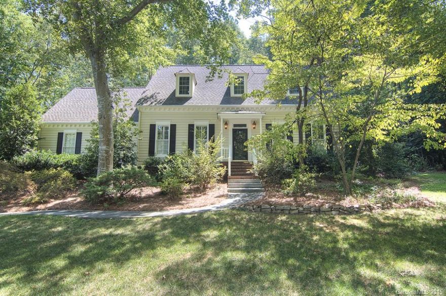 Elegant Cape Cod home in amenity rich gated River Hills.Located on gorgeous, wooded lot. Gracious foyer, formals, large kitchen w/granite & island, fabulous chef's stove,pantry/abundance of cabinets. Kitchen open to great room overlooking private backyard w pond & waterfall. Must see master bath w/custom tile, separate shower w dual shower heads & relaxing garden tub. Custom moldings, plantation shutters. Office off Master flex as exercise or nursery. Oversized garage w/workbench. Guard at gate.
