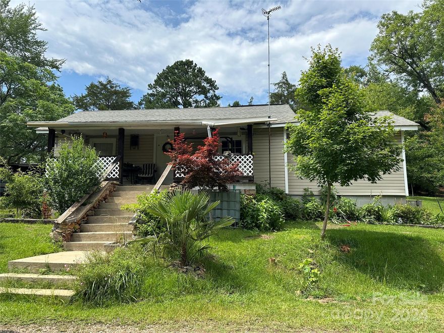 This well-maintained home is nestled on a private 13.89-acre lot in Chester, SC. This home includes a large heated and cooled auto garage and an additional older storage building used for car parts and tools. Discover the perfect addition to your backyard oasis with above-ground pool. The land has potential for subdivision; consult Chester County planning for details. Great home for someone that wants to have a quiet enjoyment and is 4 minutes from downtown Chester and 20 minutes from I-77.
