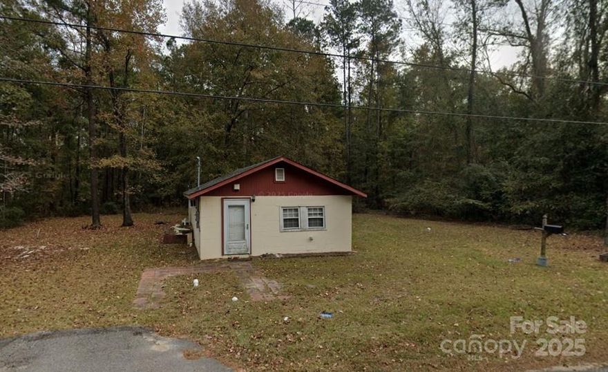Build your dream home on 3.61 acres or build to sell. Currently a small cottage on site features 2bed 1 bath with running water and electricity.  Probate approved sale ready to go..