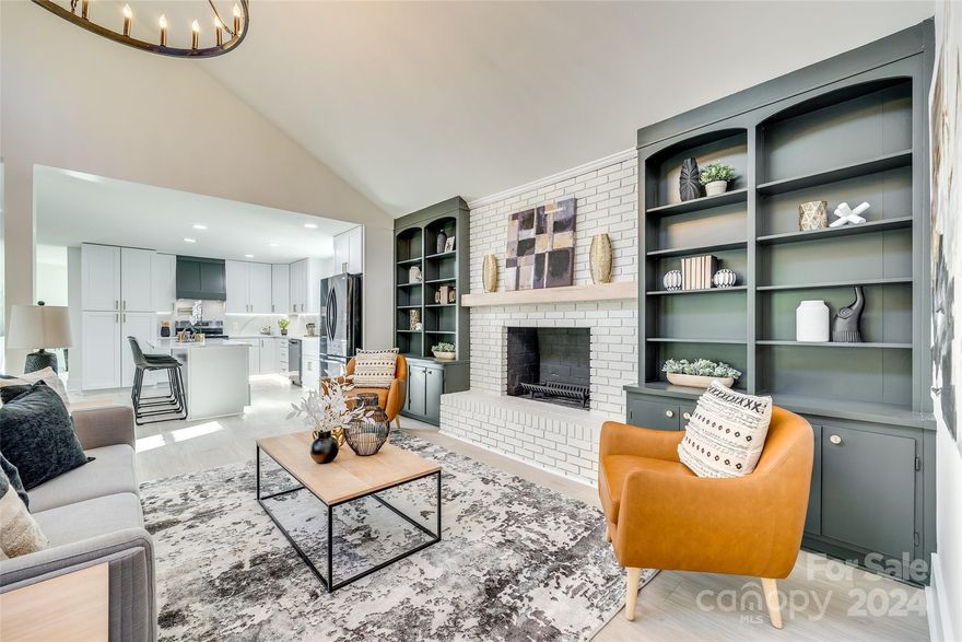 Welcome to this completely renovated ranch nestled on a classic tree lined street in the sought after city of Tega Cay, where no detail was overlooked & no expense spared! This home features a desirable floor plan allowing for comfortable living & effortless entertaining! Enjoy the spacious yet cozy great room w/a wood burning fireplace flanked by bookcases which flows seamlessly into the large dining area & kitchen. The kitchen boasts quartz countertops w/white soft close cabinetry, ample counter space, all new appliances & an oversized peninsula providing addt'l seating. Large flex space off kitchen is perfect for an office, playroom or sitting area. Features & upgrades include a walk-in laundry/storage room, new LVP flooring throughout, new windows, new roof, new siding, spacious 3 car driveway & so much more!  Outside you’ll find the most serene, private, backyard w/a huge deck - perfect for enjoying the fall weather! This home has it all – don’t miss your chance to make it yours!