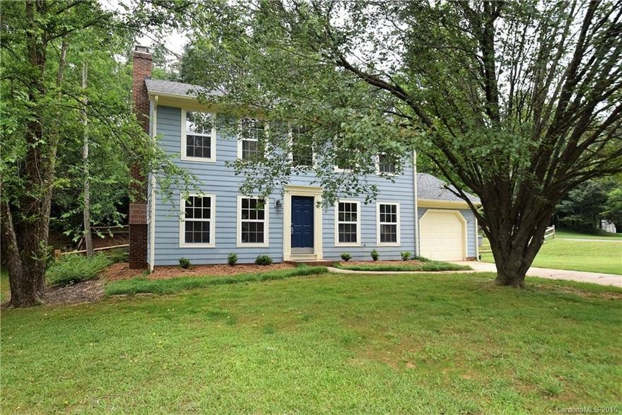 Move-in ready! Nice updates include fresh paint, new appliances (includes refrigerator), new countertops and upstairs carpet.  Large fenced yard, patio and wooded lot. Vaulted ceiling in the master.  Good sized laundry and one car garage.  New roof in 2014.  Fireplace in the Great Room.