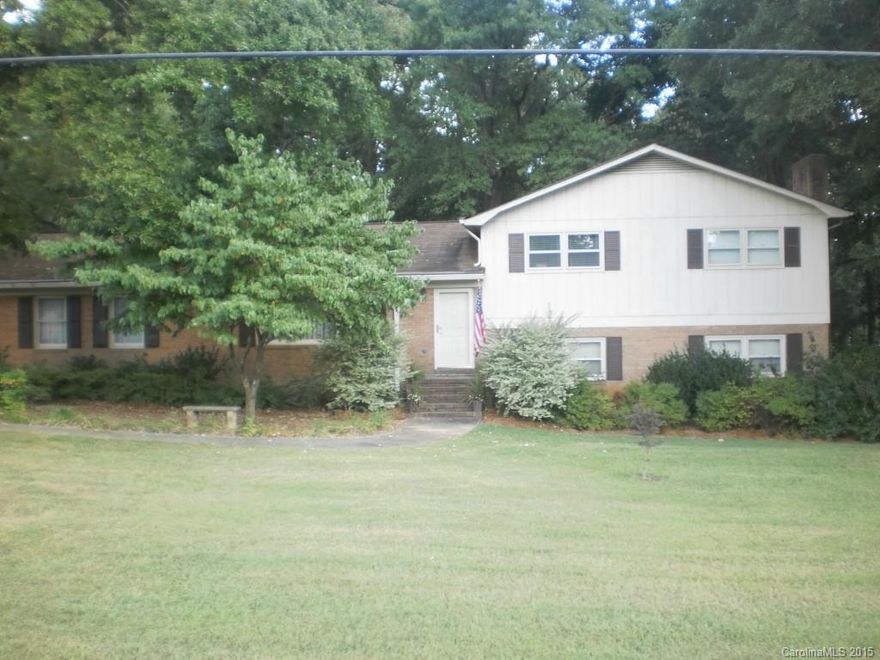 LARGE ROOMS, RECENT UPGRADES TO FLOORING IN KITCHEN/DINING, HALLS, GREAT ROOM, TWO BEDROOMS AND LAUNDRY WITH BAMBOO HARDWOOD, CERAMIC TILE, AND CARPET. LARGE BEAUTIFUL, THREE TIER 460 SF DECK WITH SWING. HEAT/AC REPLACED IN 2013. LARGE TWO CAR GARAGE WITH WORK SHOP AREA. BRICK EXTERIOR ON MAIN AND LOWER LEVEL. GREAT ROOM HAS BUILT IN DESK AND SHELVES. LARGE SHADY BACKYARD. GREAT NEIGHBORS, BEAUTIFUL RESIDENTIAL AREA.