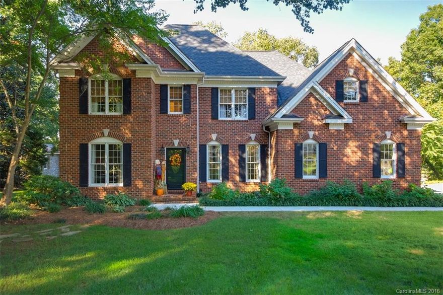 Meticulous all brick home on beautifully shaded and flat lot with sensational sunset views! This home is tastefully upgraded with amply storage, on trend design and scenic location with Lake Norman on both sides of Kiser Island. The new development in Sherrills Ford and the hustle & bustle of Mooresville make convenient book ends to this location and good taxes. Four miles into town and all the privacy and nature makes gives this property a resort feel! Six inch driveway built for RV parking...