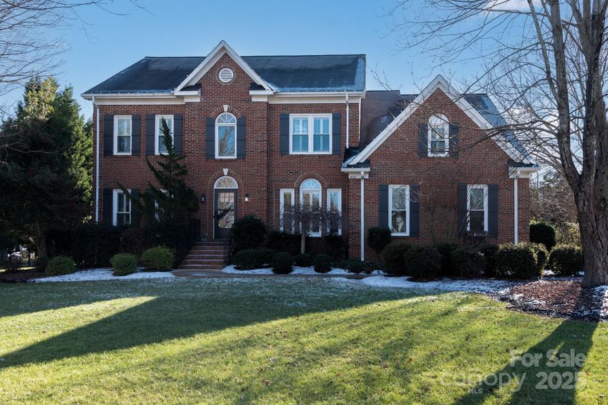This beautifully renovated all-brick home in the sought-after Heron Harbor neighborhood offers the best of Lake Norman living. Situated on a peaceful cut-de-sac, the property features an expansive saltwater pool, spa, a deeded boat slip, and access to a private boat launch - perfect for enjoying the lake to the fullest. The large fenced yard includes a dedicated play area separate from the pool, making it ideal for families. The backyard is a true oasis with a covered patio, providing a private retreat for outdoor entertaining  or relaxing.  Inside, the home offers a spacious and thoughtful layout. The main level features: a welcoming foyer with hardwood floors throughout, a formal dining room, a versitile room that can serve as a formal living room, office or music room, an open-concept kitchen and great room with a cozy breakfast area, a beautiful updated kitchen with quartzite countertops, double ovens and large island. The upper level boasts 4 bedrooms and a 5th bedroom/bonus room.