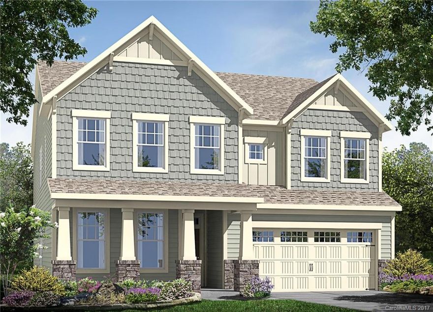 Beautiful traditional home with guest suite on the main floor.  Open floor plan with grand kitchen, large center island with granite overlooks great room. Hardwood floors downstairs. Upstairs offers a beautiful owners suite with spa like bath and 3 additional bedrooms.