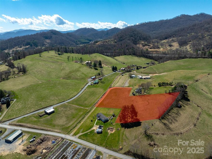 Spectacular 360 degree long range mountain/pastoral year round views from this unrestricted level to
rolling 3.08 acres located in desirable Iron Duff community with great access to Waynesville and I-40.
Well, Septic and electric to be confirmed by prospective buyers.