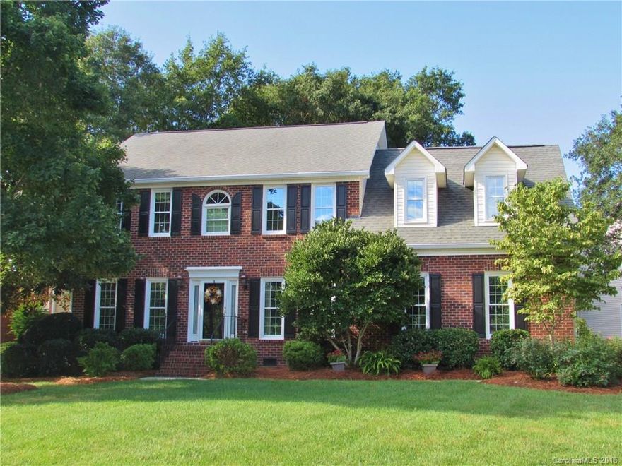 Beautifully updated and well-maintained home in the desirable Woodlands subdivision! This home offers soaring ceilings and a great floor plan including a main floor guest bedroom/office & a huge 2nd floor bonus room. The kitchen and baths have been completely redone and feature handsome granite counters & custom cabinets plus much more. Updated lighting, recently refinished hardwood floors downstairs, new carpet upstairs. Too many upgrades to mention here-see attachment for complete list!