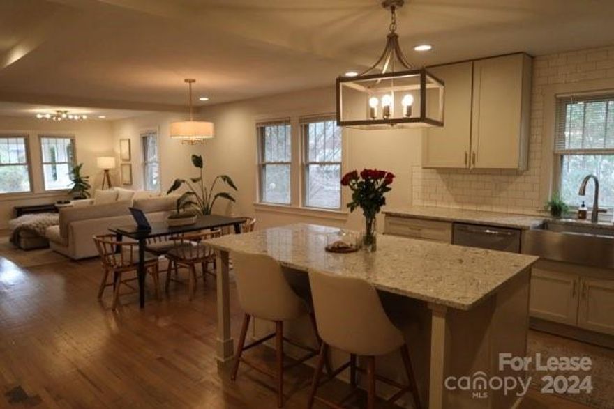 Fully Updated 1930's Home close in to Uptown. Hugh Front and rear Porches, and Hardwood floors, 3 Bedrooms and 3 Full Baths, Fantastic Kitchen Like no other includes Stainless Appliances and Large island great for Entertaining, Main Bedroom is like a Suite with Superb Bathroom with Separate Stand alone Tub and Glass Shower Double Vanieties, and spacious Walk-in Closet. Upstairs has loft with Exposed Rough Sawn joists, Two bedrooms, Walk-in Closets, and Double Vanity Full bath. Just a couple minutes to Uptown, Airport, Resturants, and great Shopping.