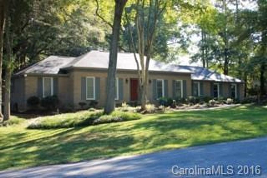 Gorgeous all brick ranch with 3 Bedrooms and 2 baths. Completely remodeled. Has new lighting, new paint, granite counter tops and wood and tile floors. The curb appeal is spectacular! Backs up to wooded area, very private back yard. Also has a workshop with running water and electric. Don't miss this one!