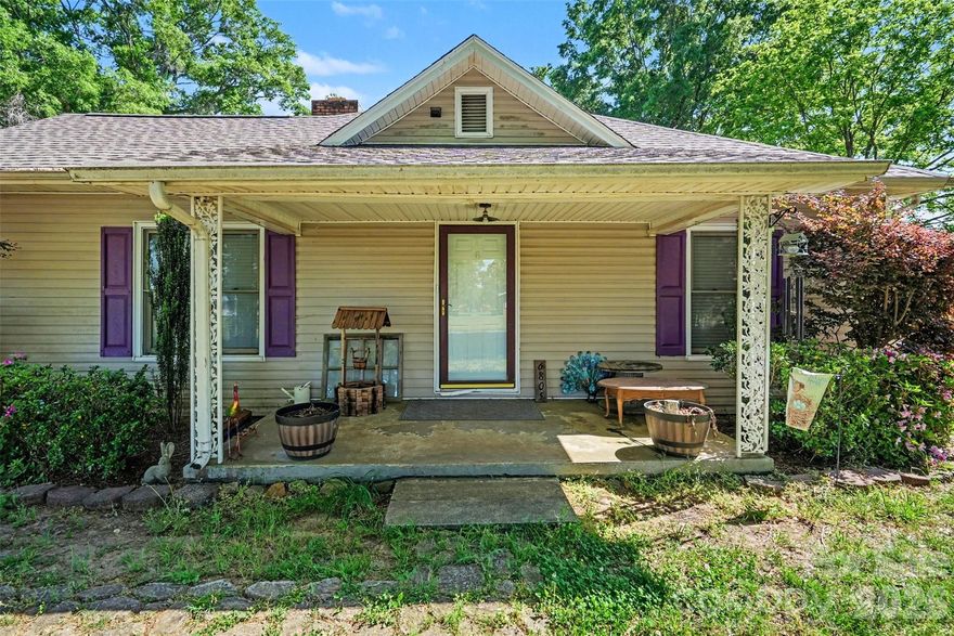 Experience the perfect blend of 1940s vintage charm and modern updates in this captivating Western Lincoln County farmhouse. Situated on over 1.4 sprawling acres, There is a concrete shared drive as well as a circle drive to the left front side of the property. All schools are just minutes away, as well as dining and shopping. All this and much more in Western Lincoln County. Just under an hour to Charlotte, Huntersville, and within 30 minutes to Hickory, Shelby, Gastonia,and 15 minutes to Walmart. Updated Solar panels