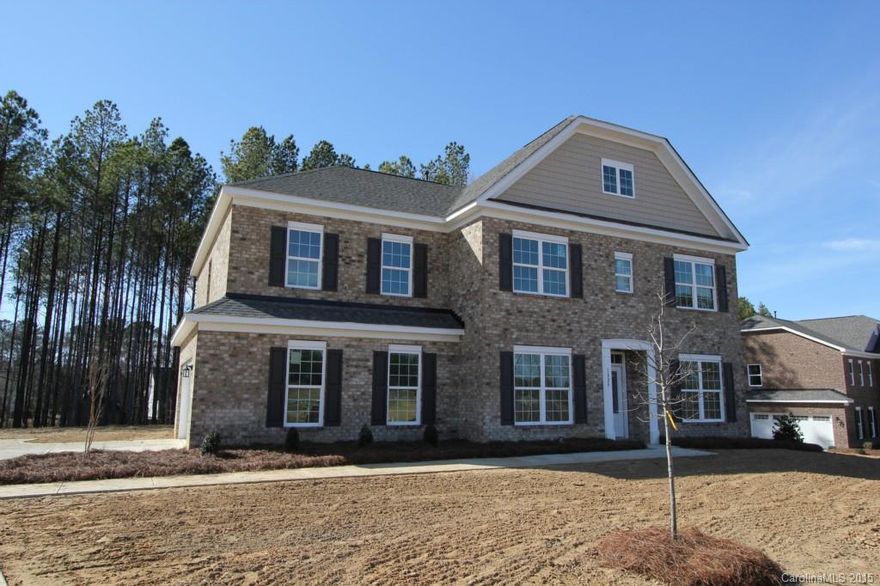 Come out and see this hidden treasure in Palm Tree Cove!  Quiet, convenient neighborhood in the desirable Clover School District!  Lake Wylie access within 1.5 miles of property!  Quality Full Brick exterior home with over 3200 square feet of living area.  Guest Suite on main level.  Granite counters in kitchen, hardwoods thruout main living areas, bronze hardware and ceramic tile in baths.  Huge bonus room upstairs with plenty of room to entertain.  Large lots and 2-car side load garage!