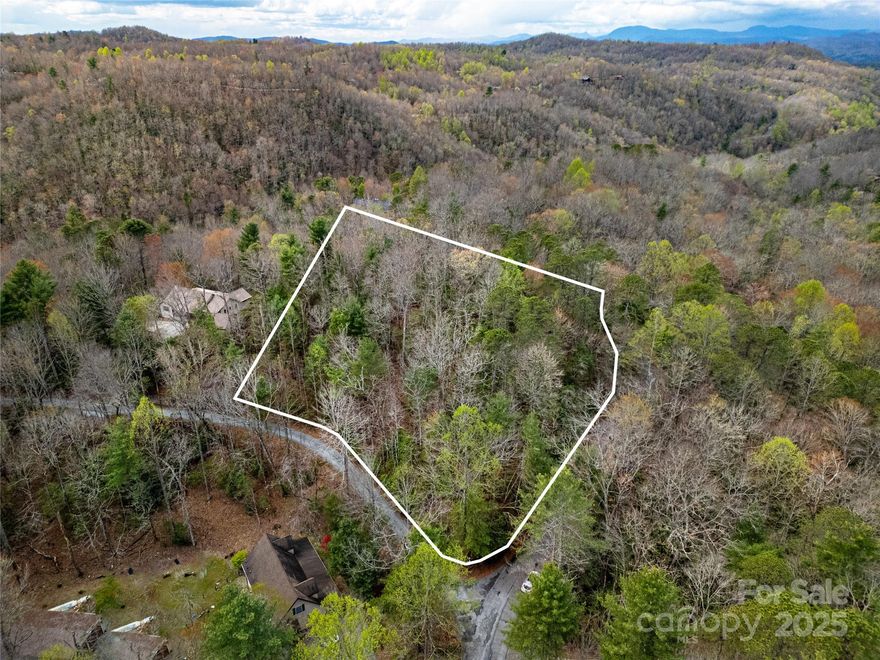 Beautiful wooded ridge top property with large level area to build your dream home. This 2.2 acre lot has an old road bed cut in up to the build site. Up at the top of the property you will be amazed at the gentle topography and excellent southern sun exposure. If you are looking for a great build site at a reasonable price schedule your showing today. There is an active 4 bedroom septic improvement permit on file.  The minimum build size in Whiskey Creek II is 1000 sq ft.