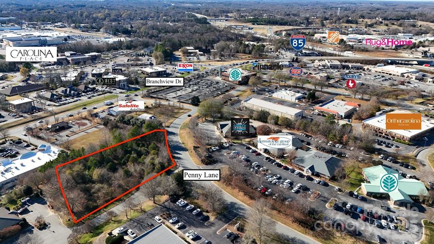 Located along Penny Lane in Concord, NC, this C-2 commercial land tract offers a development opportunity in an established commercial area. The property is conveniently located near medical offices, Atrium Health Cabarrus, Carolina Place Mall, and provides quick access to I-85, offering strong regional connectivity.
Zoned C-2 Commercial, the site allows for a variety of retail, office, medical, and service uses. The property is wooded with rolling topography, providing natural screening and flexibility for site planning within an active Cabarrus County market.