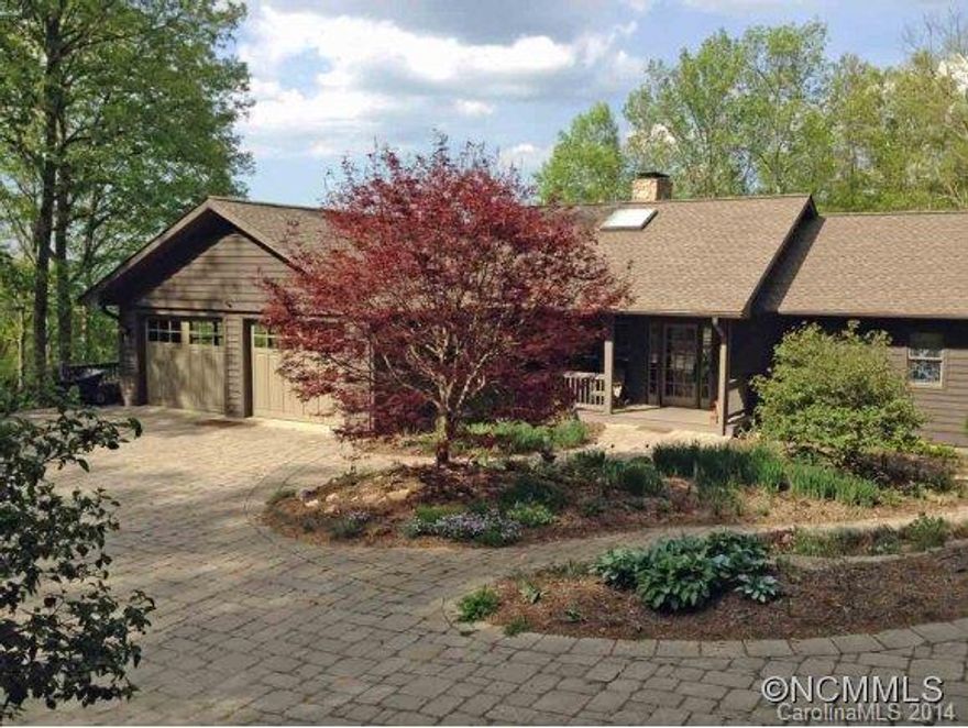7.7 ac. secluded wooded sanctuary,minutes from town. Amazing mountain views,stone walls/flowers.$200,000 in landscaping.Cozy main house (2834sq ft.) boasts 2 gas stoves, LG wood burning stone FP,wrap around deck, attached 2 car, slate floor garage. Main house and apt have top-of-the-line appliances.Upscale apt is over a detached single car gar/workshop/hobby room w/separate wash/dryer/cable/heat. Rented, but can be vacated at new owner request.