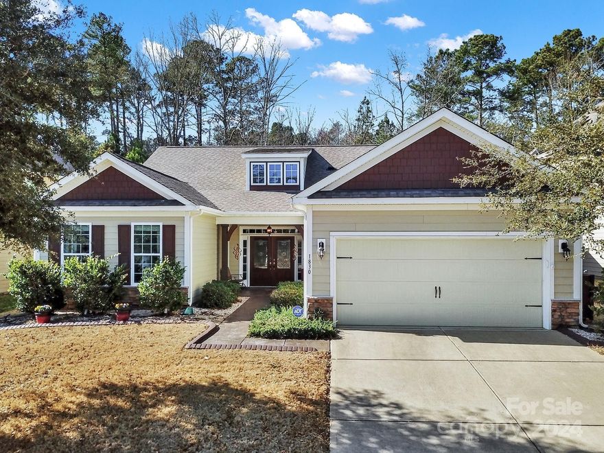 Welcome to the desirable community of Lake Ridge! Open the custom french doors to this upscale ranch home to find soaring ceilings, beautiful wood floors, a gorgeous custom designed mantel w/marble surround fireplace & built-ins. This open floor plan is perfect for entertaining. Large chef's kitchen w/ gas cooktop, double ovens, granite countertops & a huge breakfast bar. The dining area has tons of windows & room to seat 10+ guests. The owners bedroom is very private & features a spa bath w/ double sinks, tile shower, garden tub & a custom WIC designed closet. There are 2 more bedrooms & a hall bath. Drop zone & laundry off the extended 2 car garage w/ overhead storage. Relax on the screen porch overlooking the professionally landscaped lawn w/ lighting & irrigation. Fenced backyard. Warm up on the outdoor patio by the fireplace. Amenities include clubhouse, pool, gym, tennis, pickleball, basketball, bocci, playground & walking trails. Mins to I-77, shopping, restaurants & Lake Wylie.