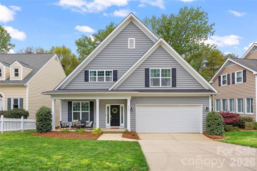 Built in 2016 and located in desirable Bishops Ridge, this beautifully maintained home offers the appeal of newer construction paired with warm finishes, thoughtful upgrades, and an ideal South Charlotte location. Rich hardwood floors throughout the main living areas welcome you inside, where an open-concept layout, vaulted great room, and designer kitchen create a bright, inviting atmosphere designed for both everyday living and easy entertaining.

The kitchen serves as the heart of the home, featuring white shaker-style cabinetry, granite countertops, stainless steel appliances, subway tile backsplash, a center island with seating, and an easy connection to both the dining area and great room beyond. Upgraded molding, trim details, and custom paint selections add character and polish throughout, while brand new carpet in the main-level primary suite and upper level provides a fresh finishing touch.

A highly desirable main-level owner’s suite offers comfort and convenience, complete with a spacious en suite bath featuring an oversized glass-enclosed shower, generous vanity space, and a large walk-in closet. Upstairs, a spacious loft provides flexible living space ideal for a media area, playroom, office, or second den. The upper level also features a second oversized owner’s suite with private en suite bath, along with two additional bedrooms and a hall bath, creating a versatile layout well-suited for guests, multigenerational living, or households needing room to spread out.

The outdoor living is equally inviting. Just off the main living area, a large rear deck provides the perfect place to relax, entertain, or enjoy peaceful views of the natural wooded backdrop beyond. The rear yard has been thoughtfully leveled and includes a fenced play area, offering a more usable and enjoyable outdoor space while still feeling private and serene.

Bishops Ridge residents enjoy HOA amenities that include a pool, tennis courts, clubhouse, and water, adding both convenience and lifestyle appeal. Set in a wonderful South Charlotte location with easy access to a wide variety of shopping, dining, and everyday conveniences, this home offers the space, style, and setting today’s buyers are looking for.

This home offers the rare combination of newer construction, flexible living, beautiful finishes, and a peaceful outdoor setting in one of South Charlotte’s most convenient location!