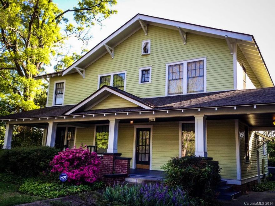 Two owner historic home w/ luxurious master bath added, coal gas fireplace in master, lg rooms & spacious closets! Original character w/ a renovated kitchen. Gleaming hardwood firs, wide casings, French doors leading to dining room & to sunroom! Gas furnace for main flr & heat pump for upstairs! 40 yr roof installed 1998. Designer paint t/o, extensive moulding. Tons of cabinet space in kitchen. Detached garage has studio space above. Private backyard w/ brick patio. Beautiful, lush landscaping!