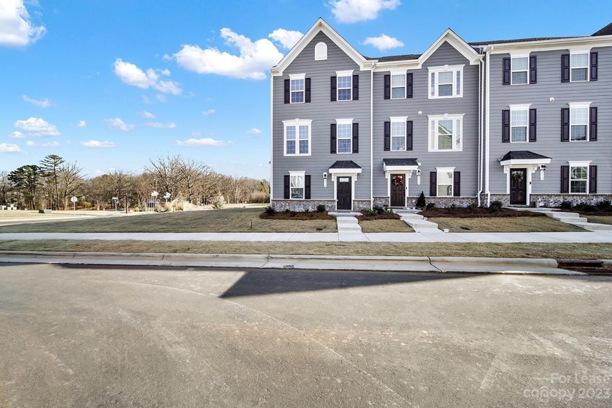 Welcome to this lovely 3-story townhome located just down the street from the nearby hospital and 10 minutes from Charlotte! The spacious kitchen is complete with granite counters, stainless steel appliances, and a large island perfect for meal preparation and entertaining. The open floor plan allows for a seamless flow creating a welcoming atmosphere for gatherings with friends and family. The convenience of a 1-car garage provides ample storage space and protection for your vehicle. Enjoy the outdoors on the balcony located at the back of the home, providing a peaceful retreat to relax and unwind. The large primary bedroom boasts a spacious closet, ensuring you have plenty of room for all your belongings. The en suite bathroom adds a touch of luxury and privacy to your daily routine. This townhome offers a modern and stylish living experience, with its 3-story design and desirable amenities. Furniture will be removed from home prior to move in.