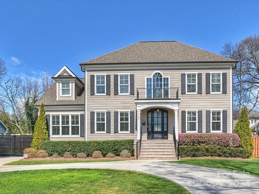 Stunning custom home, built in 2014 with fabulous floorplan designed for everyday living. Two-story foyer welcomes you with gleaming hardwoods & classic moldings and finishes. The gourmet kitchen boasts custom cabinetry, large island, stainless appliances and spacious breakfast area. Family room is adorned with a gas fireplace and French doors to the covered porch. Main level primary suite offers two walk-in closets & luxury bath featuring dual vanities, oversized shower, & free-standing tub. A convenient side entry provides an ideal drop zone with custom built-ins. Four bedrooms up with bonus & two additional full baths. 9' ceilings up & down. Entertain effortlessly in the private backyard oasis, complete with covered porch, patio, inground pool and spa. Additionally, the detached 2-car garage features a second living quarters on the upper level, boasting a large open room, convenient kitchenette and modern bath. Walkable to Freedom Park and all the shopping & dining options nearby.