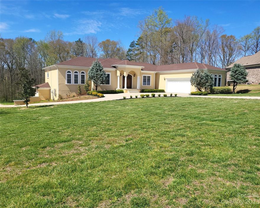 This custom-built Mediterranean-style home has it all! Located in a gated community w/ 6 BR & 6 BAs, this home is perfect for large families or multi-generational households. The beautiful 7-acre parcel is full of birds, bees, and mature trees & backs to Sugar Creek. The high ceilings & unique, open floorplan create a grand & spacious feel, while the formal rooms, flex space, rec room, & office provide plenty of versatility and functionality. The custom gourmet kitchen w/ a huge island, granite counters, commercial-sized SS appliances is a fantastic feature that can make cooking a joy. The walkout basement can be a separate living space & has over 1000 sf storage. The outdoor gazebo, large screened-in porch & covered patios below are great features that allow for outdoor living and entertainment. The solar panels & tankless water heater are great additions to save money & reduce energy consumption. In-ground irrigation w/ dedicated well. 2 separate garages.