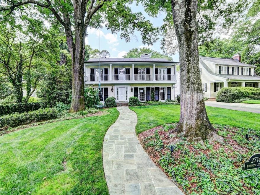 Beautiful home on one of the most desirable streets in Charlotte. Living Room, Large Family Room, & sitting room all on main. Renovated kitchen w/ gorgeous island, open to sitting room & overlooking backyard. Laundry room & separate office space also on main. 4 bedrooms & 4 baths upstairs-master suite features his & her bathrooms!  5th bedroom suite is located off the garage-currently used as an office, but has full bath & walk in closet and seperate entry. 2 car garage, large slate terrace.