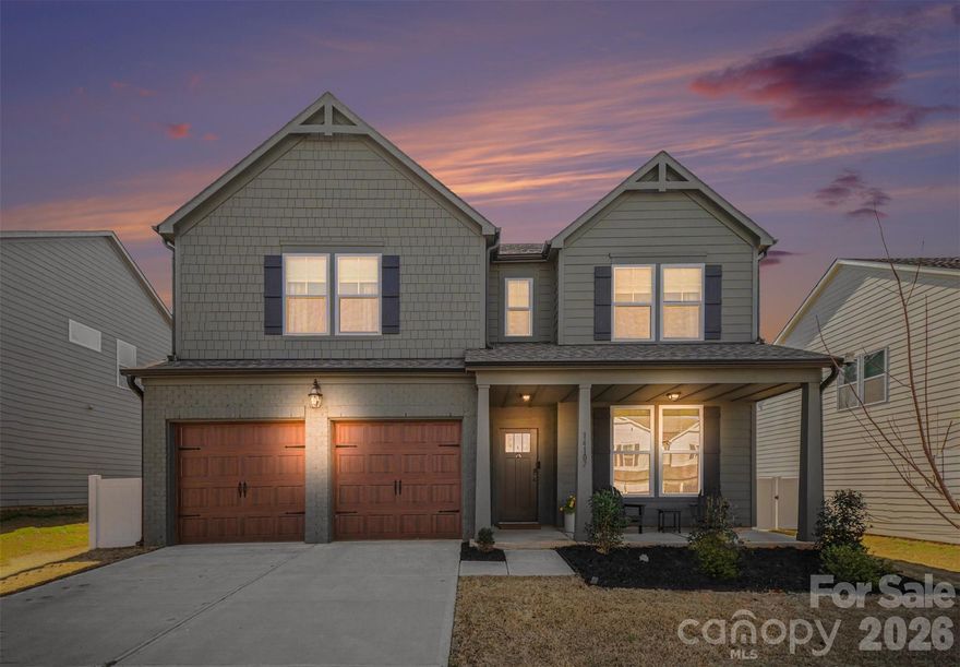 Skip the wait for new construction and experience the best of Queen City living today. This stunning 2024-built home in the sought-after Enclave at Caldwell sits inside the 485 loop in Charlotte's thriving University City corridor — minutes from Reedy Creek Park, UNC Charlotte, the Lynx Blue Line, and Uptown. The open-concept main level is built for how people actually live — a chef's kitchen with upgraded pendant and under-cabinet lighting, induction range, quartz island, and walk-in pantry flows into sun-drenched living areas that lead out to a private 19×14 screened-in porch. A dedicated home office, main-floor guest suite, coffered ceilings, upgraded staircase lighting, and a 240V EV-ready garage outlet are the kinds of details that set this home apart. Upstairs, the primary suite delivers a true sanctuary: sitting room, spa bath with herringbone tile shower, soaking tub, and a walk-in closet with custom shelving. Homes like this — move-in ready, loaded with upgrades, in this location — don't last.