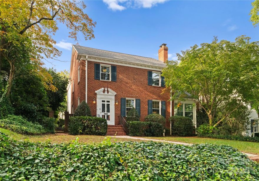 Gorgeous updated, traditional brick home in the heart of Myers Park. So much charm in this home. Hardwood floors throughout the home. Welcoming living room with limestone tile fireplace, opens to bright Sunroom. Formal dining room adjoins the renovated Kitchen which has beautiful granite countertops, tile backsplash, center island and stainless steel appliances. Large family room with fireplace overlooking private, well manicured yard. Upper level with stunning primary suite,  Large walk in closet with custom organization system. Primary bath updated in 2020 with marble counters, large standing glass shower, and double vanities. Three additional spacious bedrooms and updated full bath. Gorgeous fenced in backyard with private brick patio. One car detached garage. Walkable to schools, restaurant's and shopping.