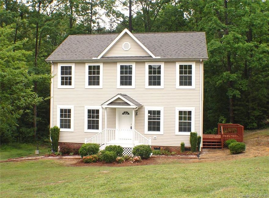 Immaculate move-in ready 2 Story Home on 1.5 Acre lot in well manicured established subdivision of Shadow Oaks.  New stainless steel appliances, lighting, and all new flooring, and new interior painting.  Master Bedroom on main floor, master bath with large garden tub and separate shower.  3 more bedrooms and full bath on 2nd floor.  Open floor plan, exterior deck. Private wooded setting on cul-de-sac street.  Very convenient access to I77 for travel into Rock Hill or Charlotte.