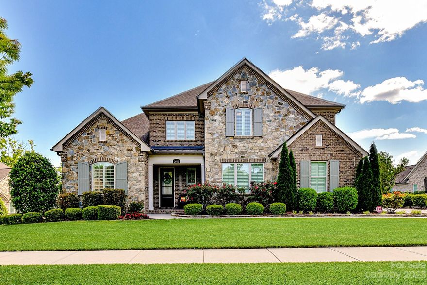 Absolutely Stunning 'Classica' built home w/PRIMARY BEDROOM ON MAIN FLOOR! Immaculately maintained. Large kitchen w/granite countertops, gas range, hood vent & huge island opens to Great rm & dining area. Lrg walk in pantry desk/office off kitchen. Plantation shutters. Wood floors in all living areas. Pristine carpet in all bedrooms. Main floor flex room for office/work out room. Beautiful primary suite w/spectacular primary bathroom. Large walk-in closet w/custom built-ins & door to laundry rm. Screen porch w/Easy Breeze windows is the perfect oasis for relaxing, reading, dining, watching TV. Step outside to the totally private yard w/custom patio w/lights & gas line for grill. Upstairs w/huge loft area, huge walk-in storage, 3 good size bedrooms all w/direct bath access, one ensuite, the other jack & jill. This home has beautiful custom finishes. Tasteful & neutral decor. Treed corner lot & grassy median in front gives you privacy galore! Fridge in kitchen will convey. 3 car garage